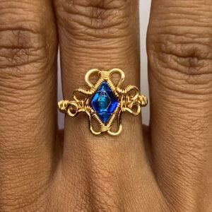 Gold and Blue Antique-Style Ring with Ornate Metalwork